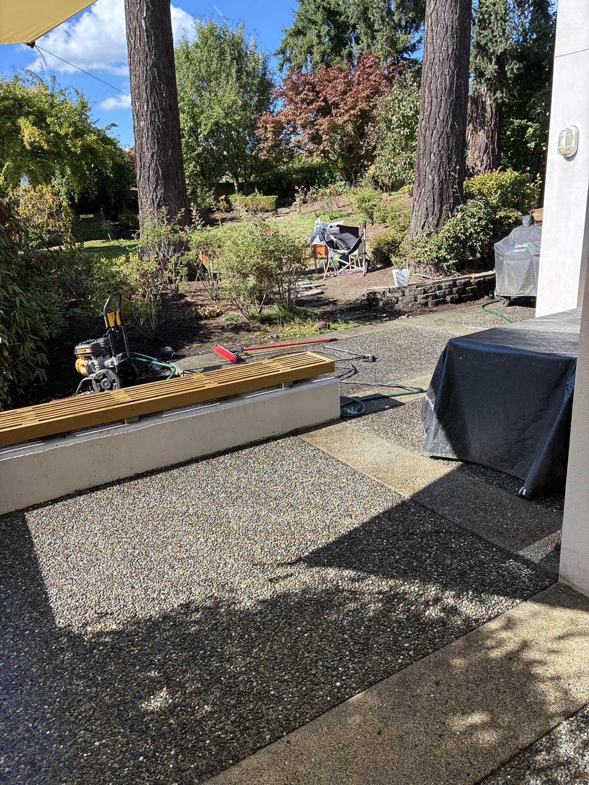 Backyard concrete patio after pressure washing