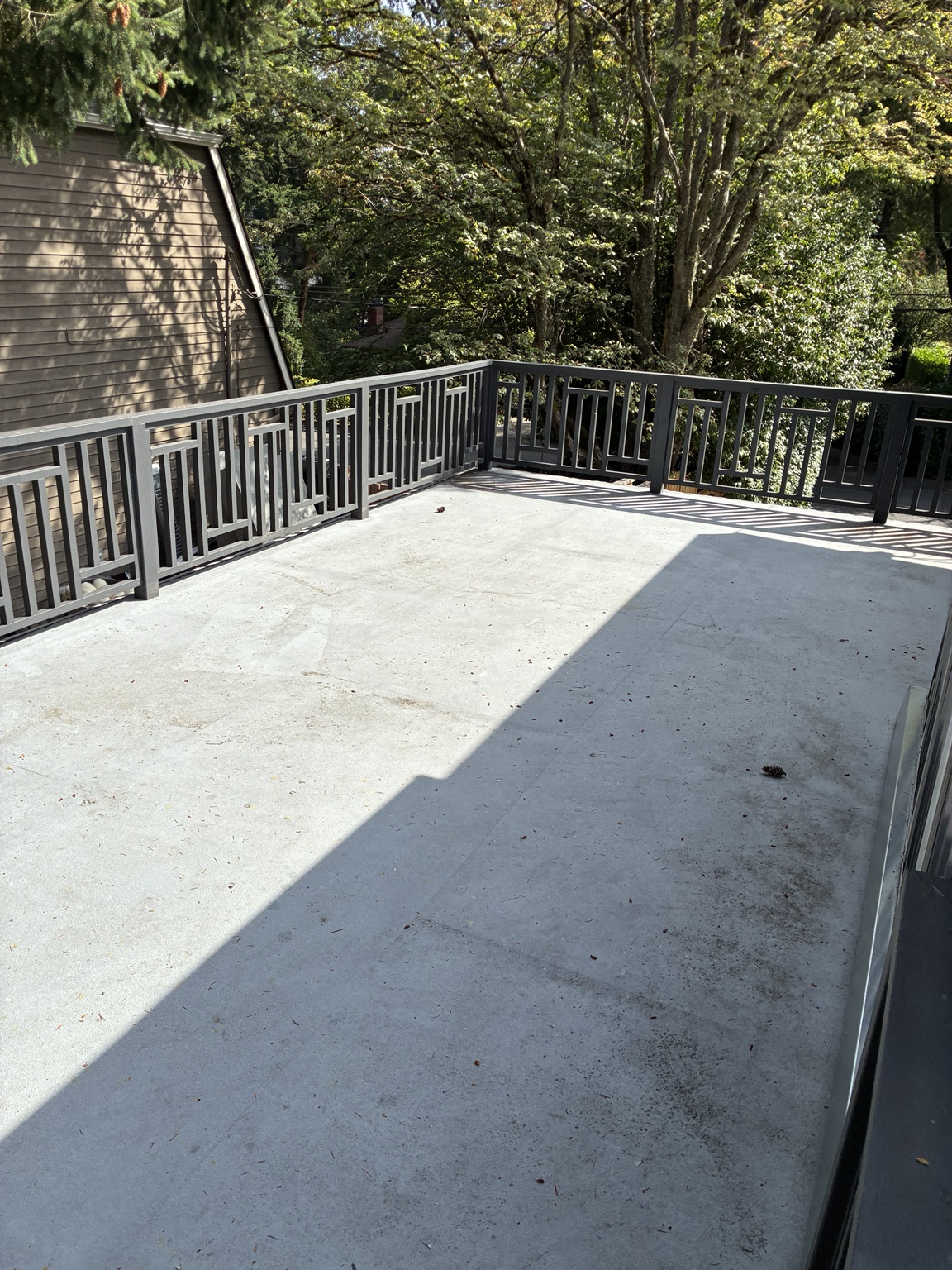 Upper concrete patio before cleaning